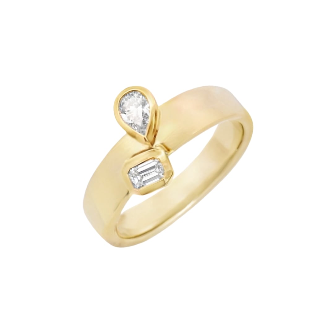 Bezel Set Pear and Emerald Cut Diamond Ring