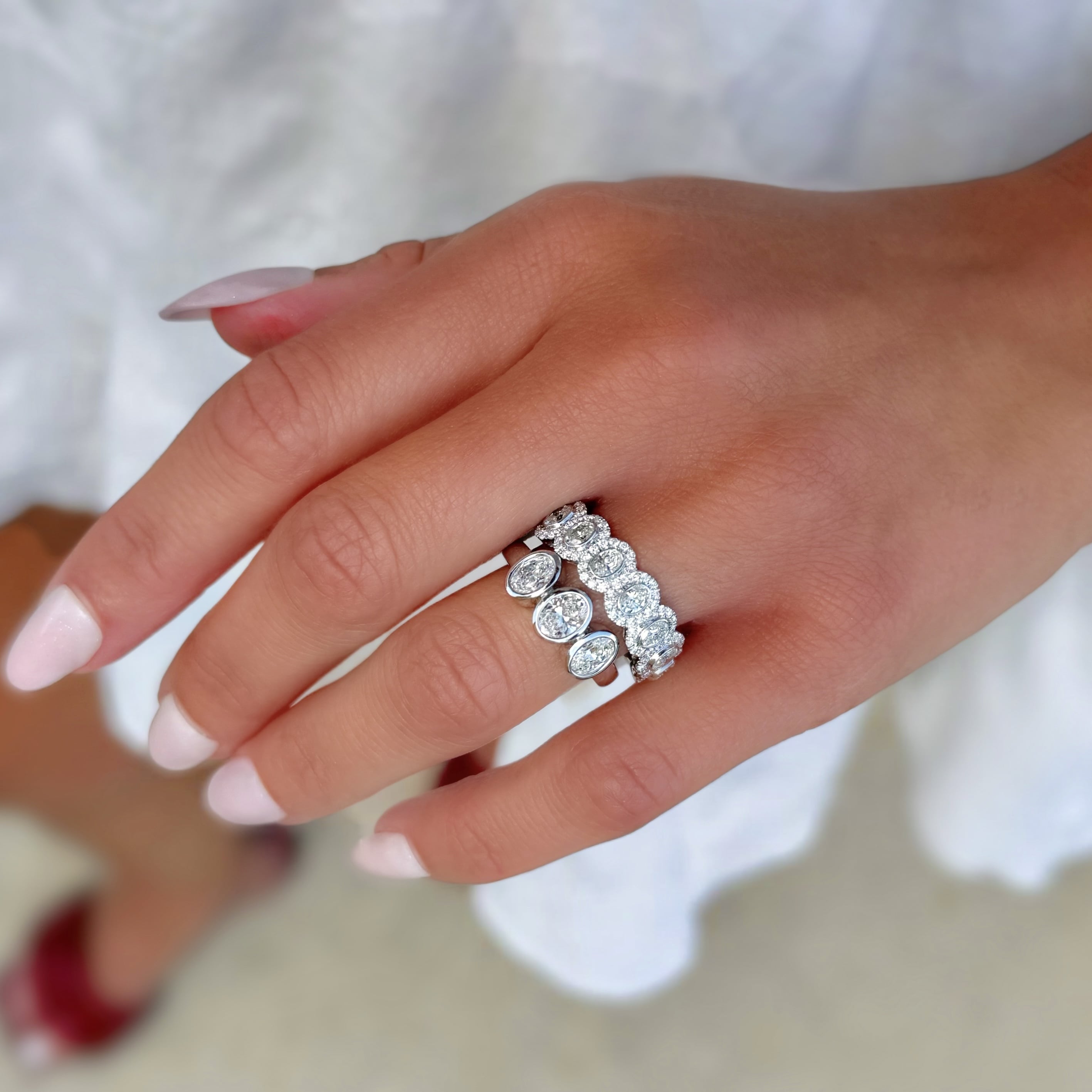 3 Stone Oval Diamond Bezel Ring