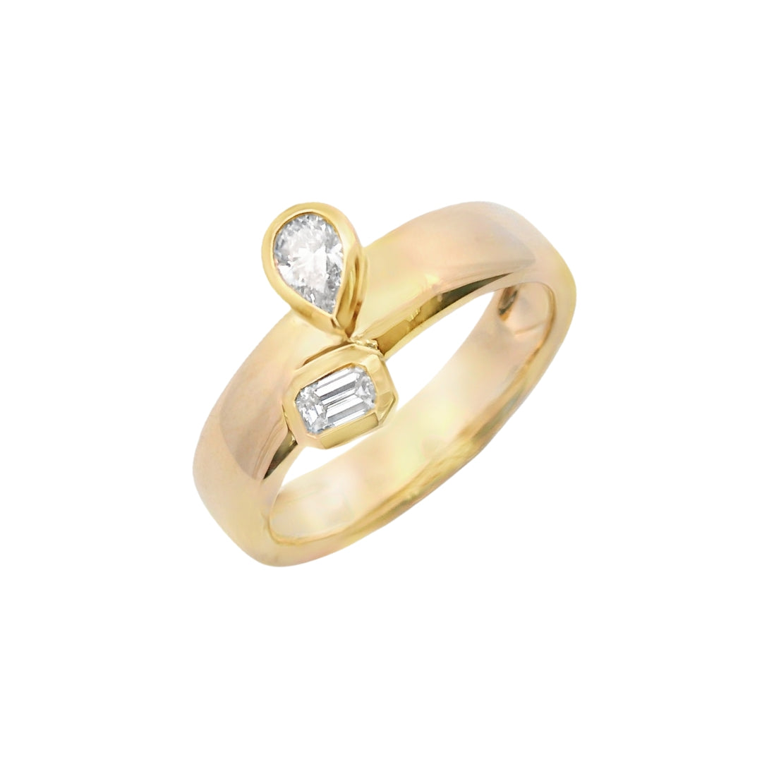 Bezel Set Pear and Emerald Cut Diamond Ring