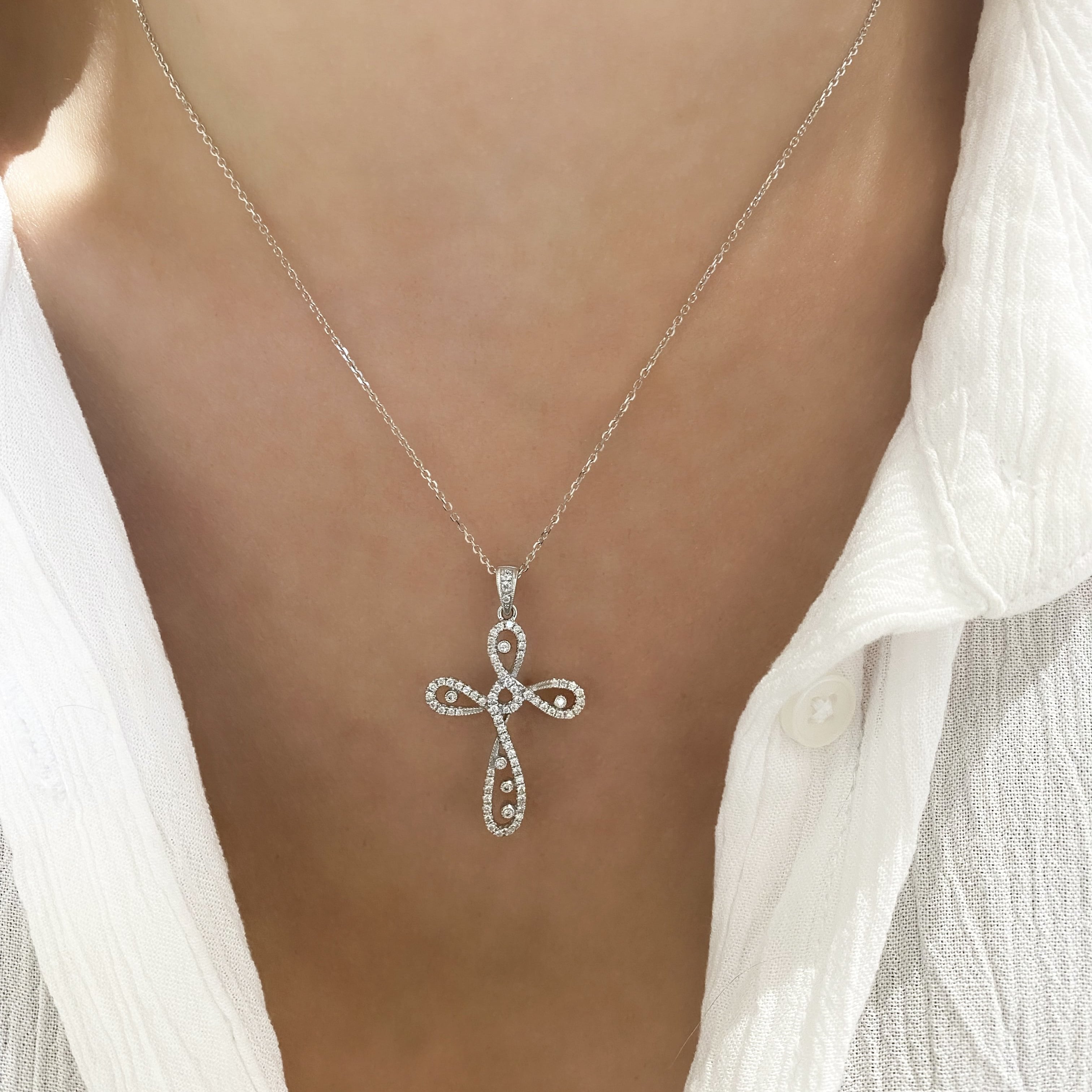 Diamond Swirl Cross Necklace