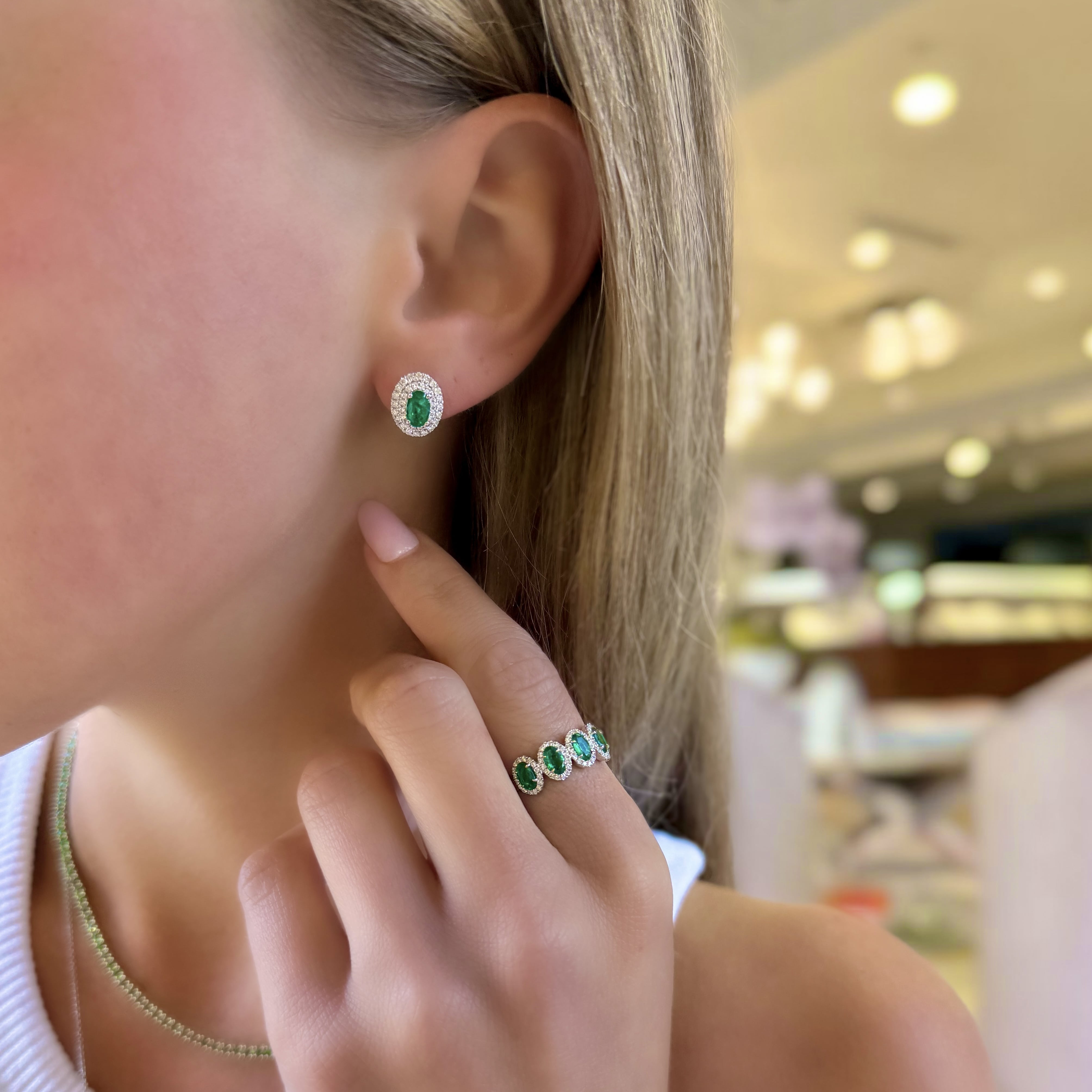 Oval Emerald and Diamond Halo Earrings