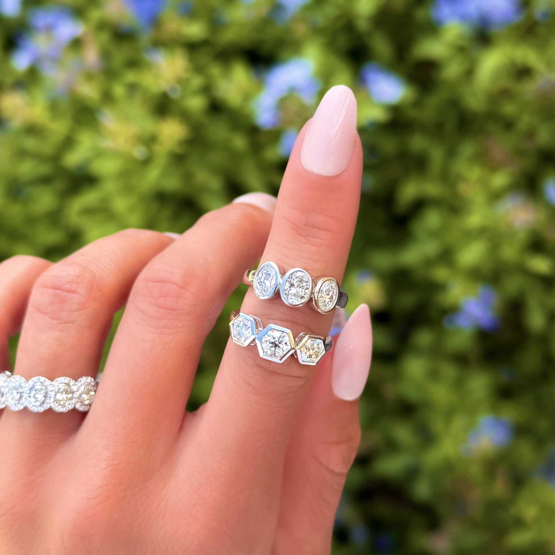 3 Stone Oval Diamond Bezel Ring