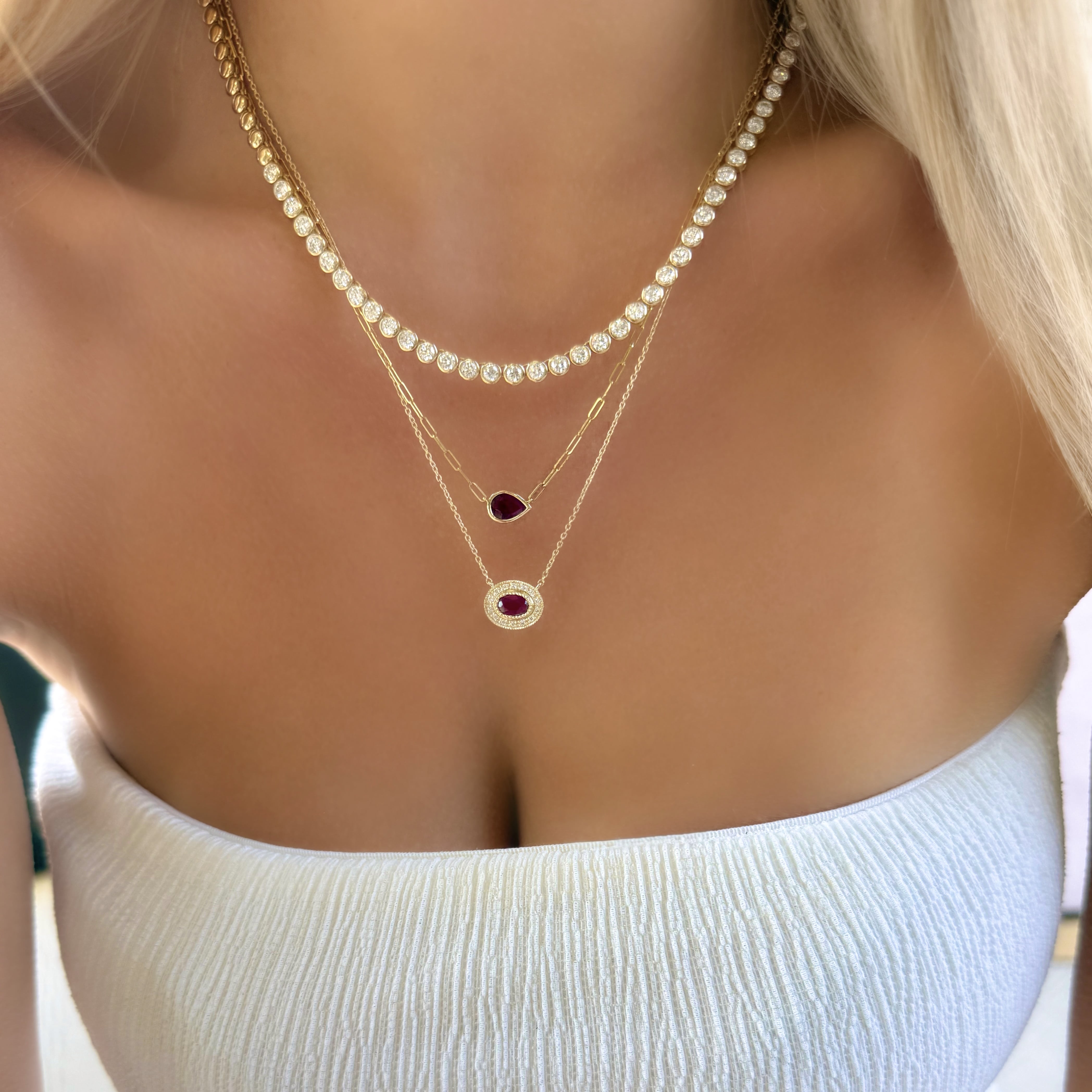 Oval Ruby and Diamond Halo Necklace